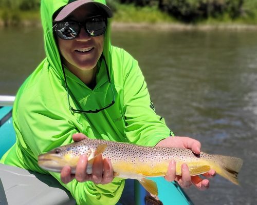 Successful trout catch during fly fishing Rio Grande Colorado with Jackalope Anglers guide service